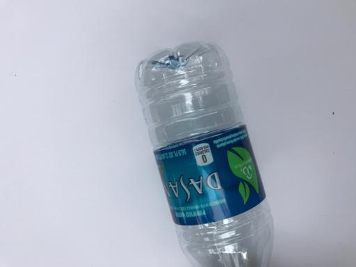 A plastic bottle used in QEV's published photograph example.